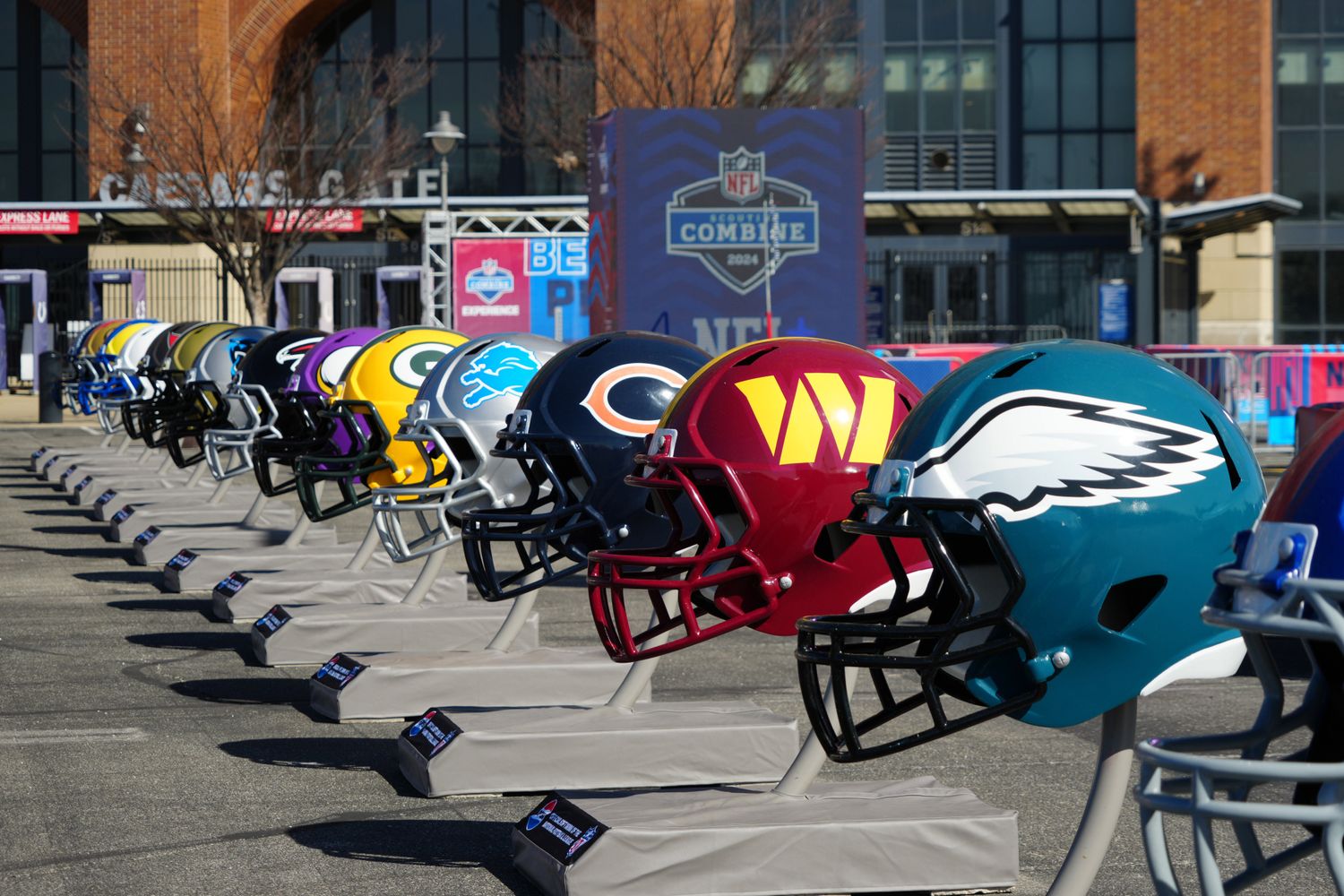 A general view of large Philadelphia Eagles, Washington Commanders and Chicago Bears helmets at the NFL Scouting Combine Experience at Lucas Oil Stadium. Mandatory Credit: Kirby Lee-USA TODAY Sports